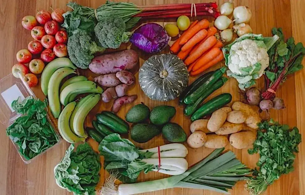 A Farmacy Organics fruit & veg box packed with fresh produce